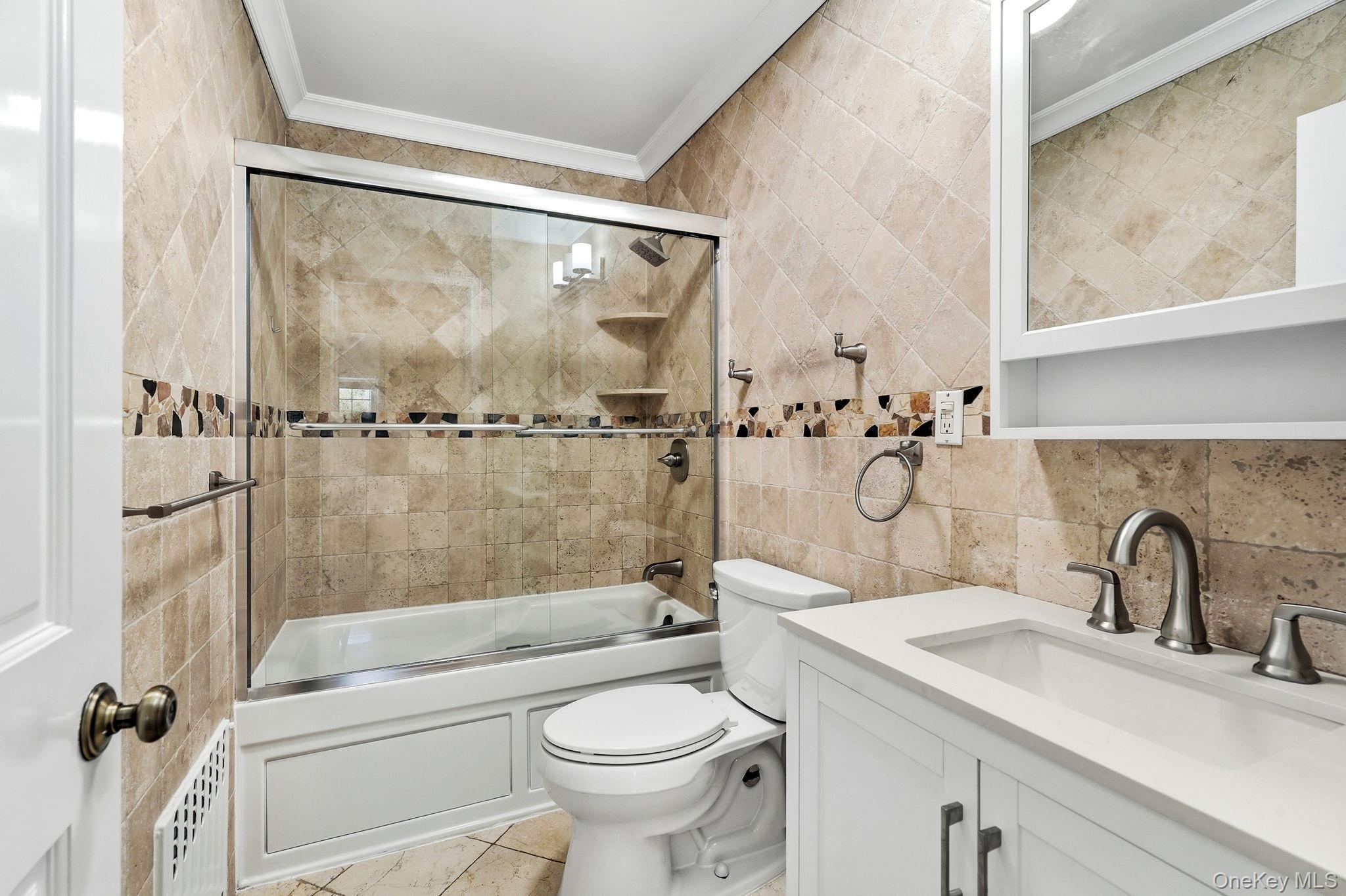317 Hornidge Road Mamaroneck, NY 10543 - Photo 16 of 21 a bathroom with a sink toilet and shower