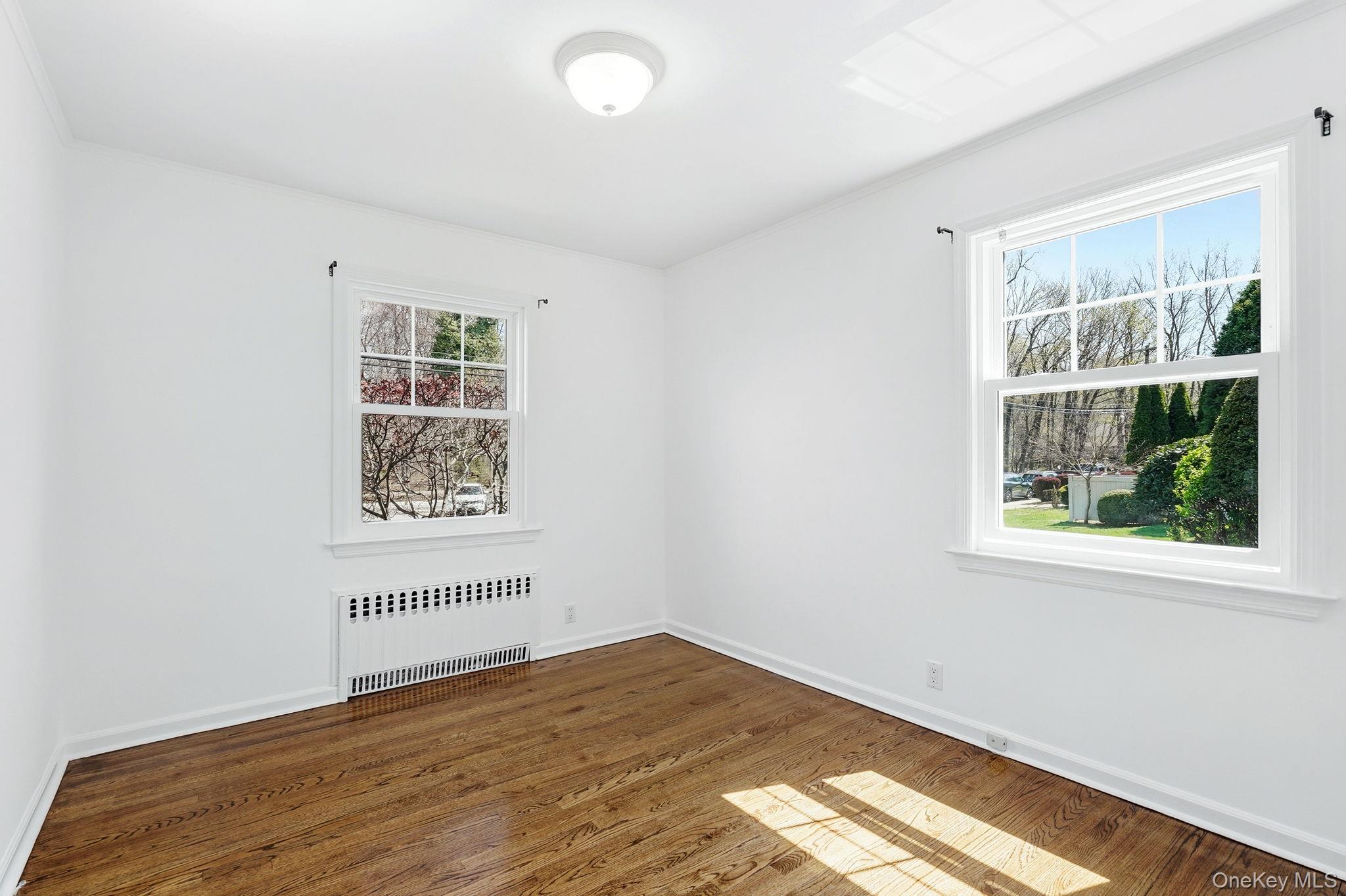 317 Hornidge Road Mamaroneck, NY 10543 - Photo 18 of 21 an empty room with a window