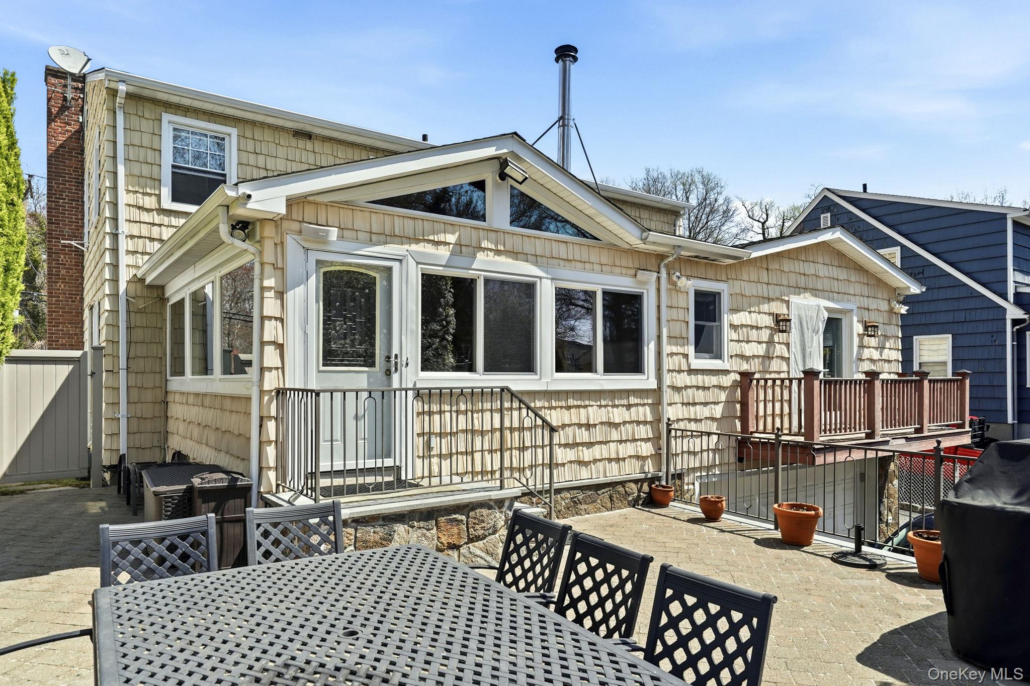 317 Hornidge Road Mamaroneck, NY 10543 - Photo 20 of 21 a front view of a house with parking