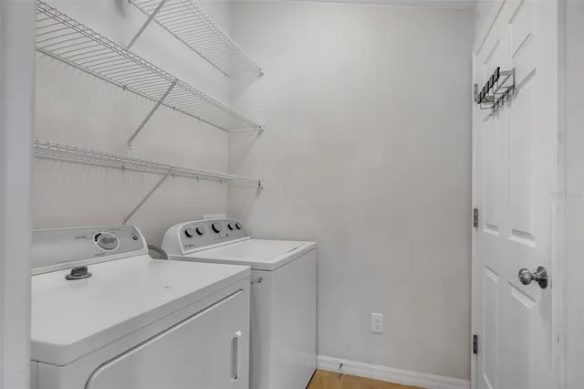 a utility room with dryer and washer
