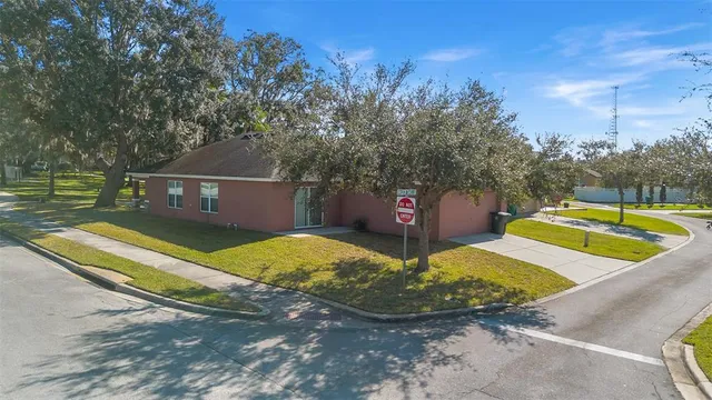 a view of a pool with a yard