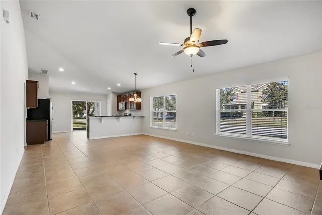 a view of kitchen and windows