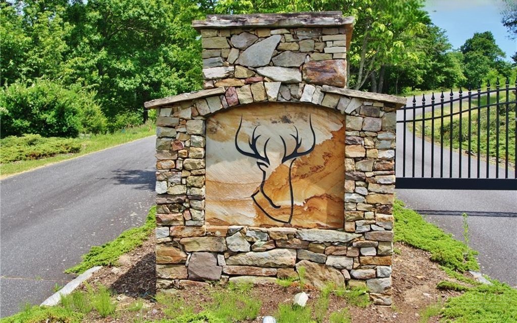 Lot 5 Wapiti Way Boone, NC 28607 - Photo 12 of 13 a view of a staircase with wooden fence