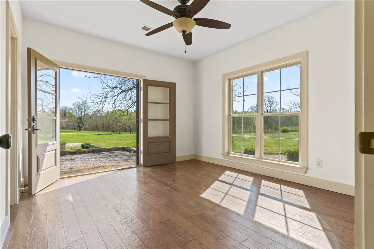 3887 Lucy Road Millington, TN 38053 - Photo 8 of 25 BEDROOM 4 DOWN features Hardwood Floor and Exterior Doors