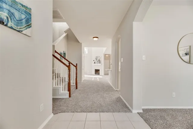 a view of a hallway with entryway