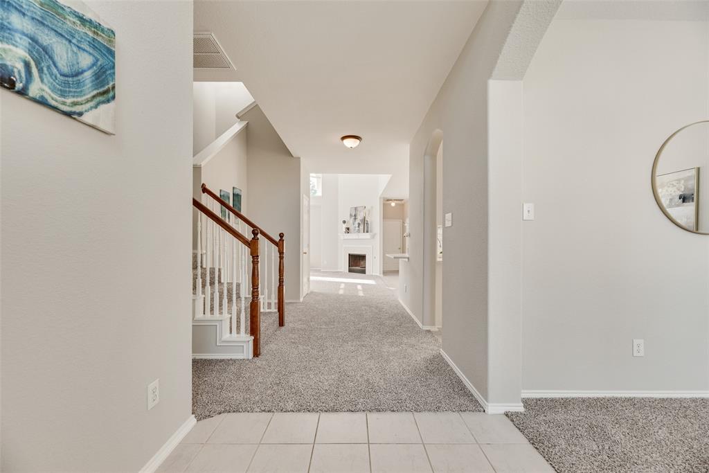 4404 Ridge Point Lane Plano, TX 75024 - Photo 2 of 18 a view of a hallway with entryway