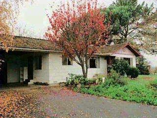 244 Pleasant Hill Road Sebastopol, CA 95472 - Photo 1 of 1 a front view of a house with garden