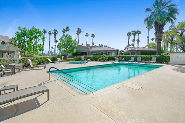 a view of a swimming pool and outdoor space