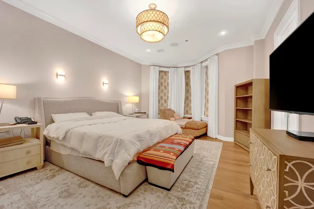 a bathroom with a bathtub and shower