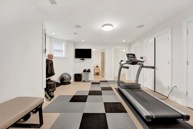 a utility room with sink dryer and washer