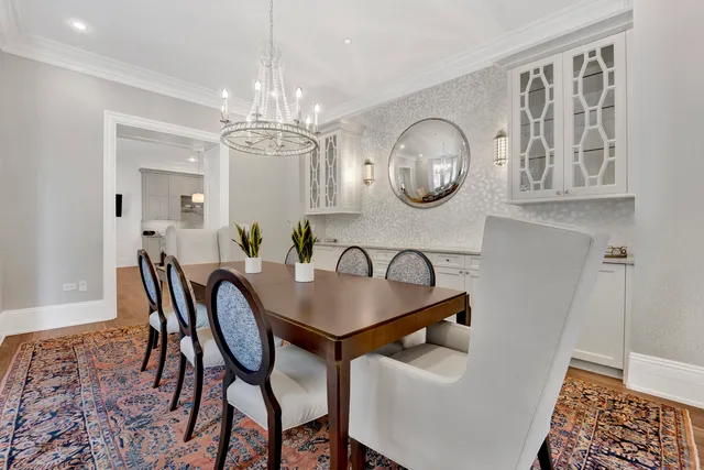 a view of a dining room with furniture and window