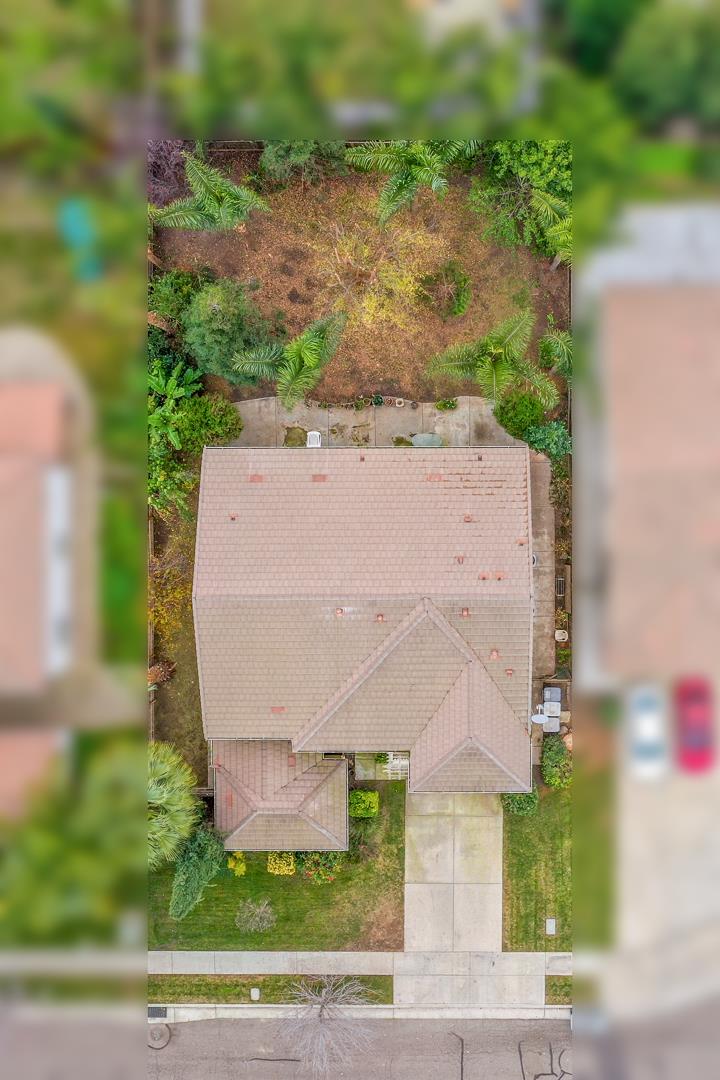 2563 Riviera Court Tulare, CA 93274 - Photo 13 of 31 an aerial view of a house