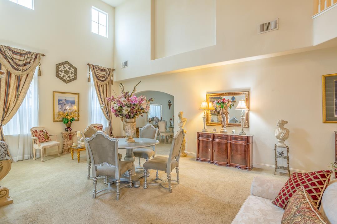 2563 Riviera Court Tulare, CA 93274 - Photo 22 of 31 a dining room with furniture and window
