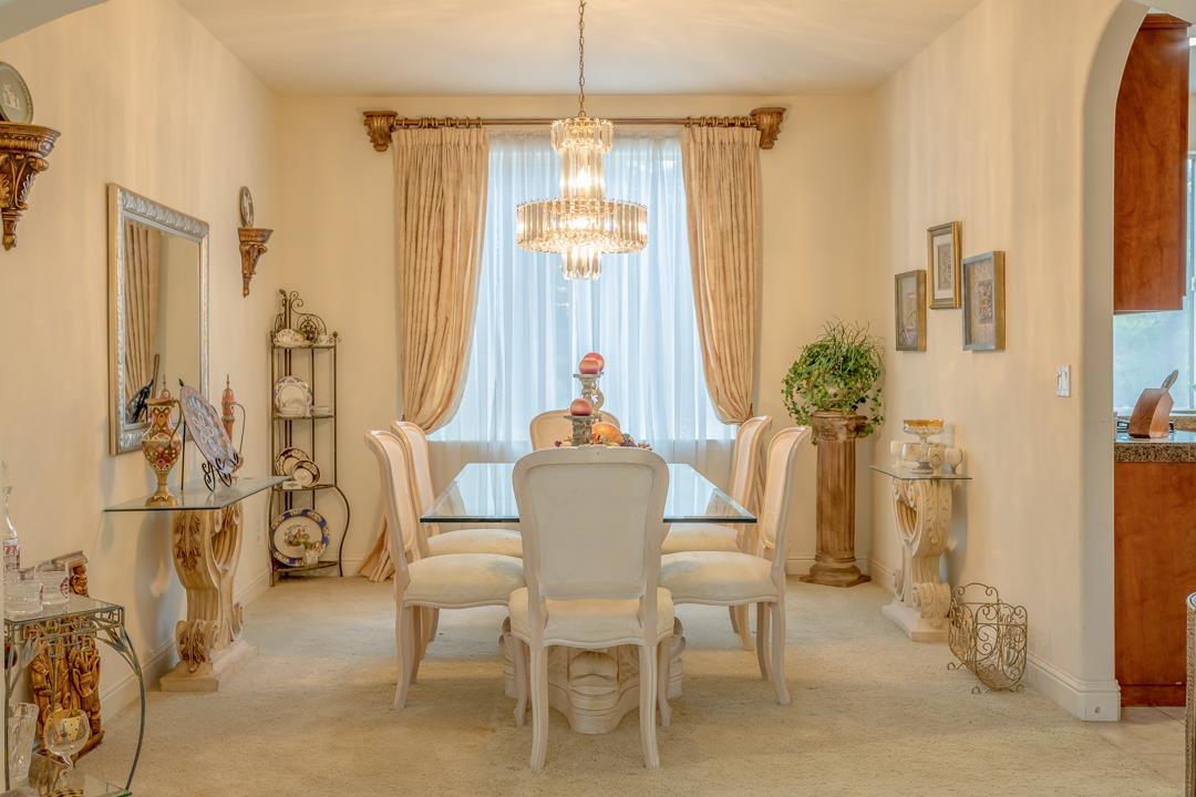 2563 Riviera Court Tulare, CA 93274 - Photo 23 of 31 a dining room with furniture window and outside view