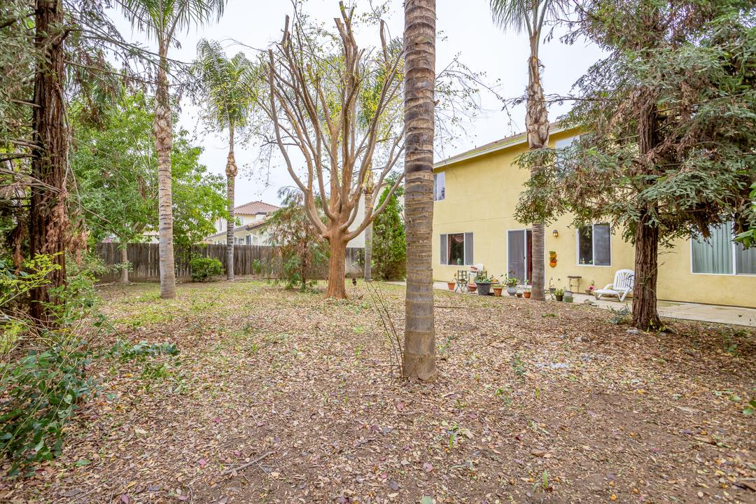 2563 Riviera Court Tulare, CA 93274 - Photo 9 of 31 a view of a house with a yard