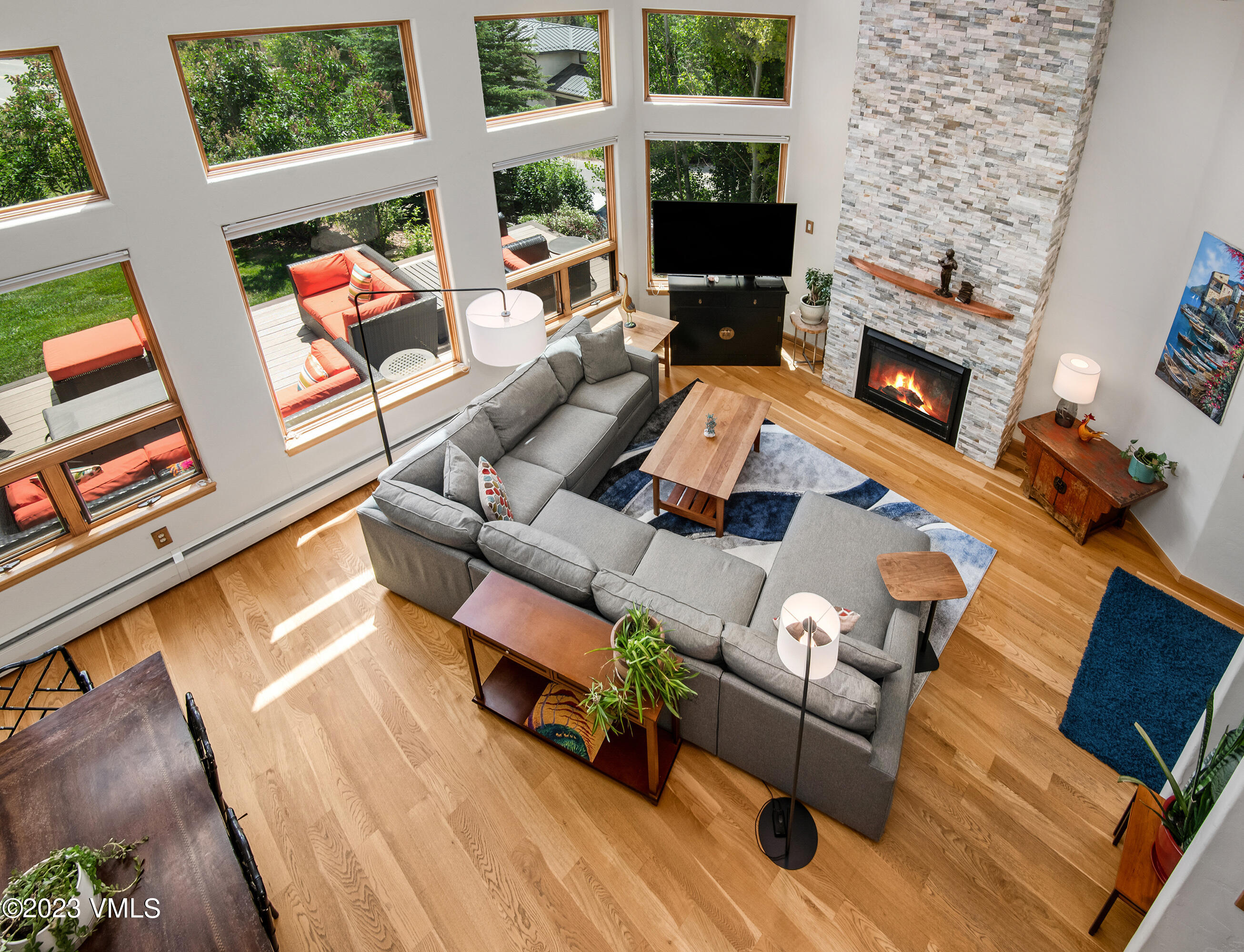 1471 Singletree Road Edwards, CO 81632 - Photo 13 of 47 a living room with furniture fireplace and flat screen tv