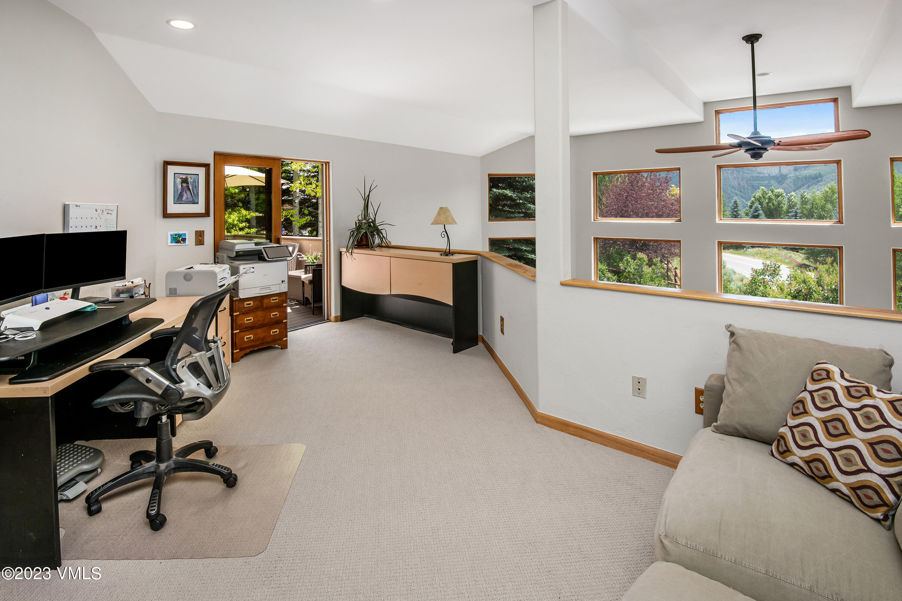 1471 Singletree Road Edwards, CO 81632 - Photo 26 of 47 a view of a workspace with furniture and a window