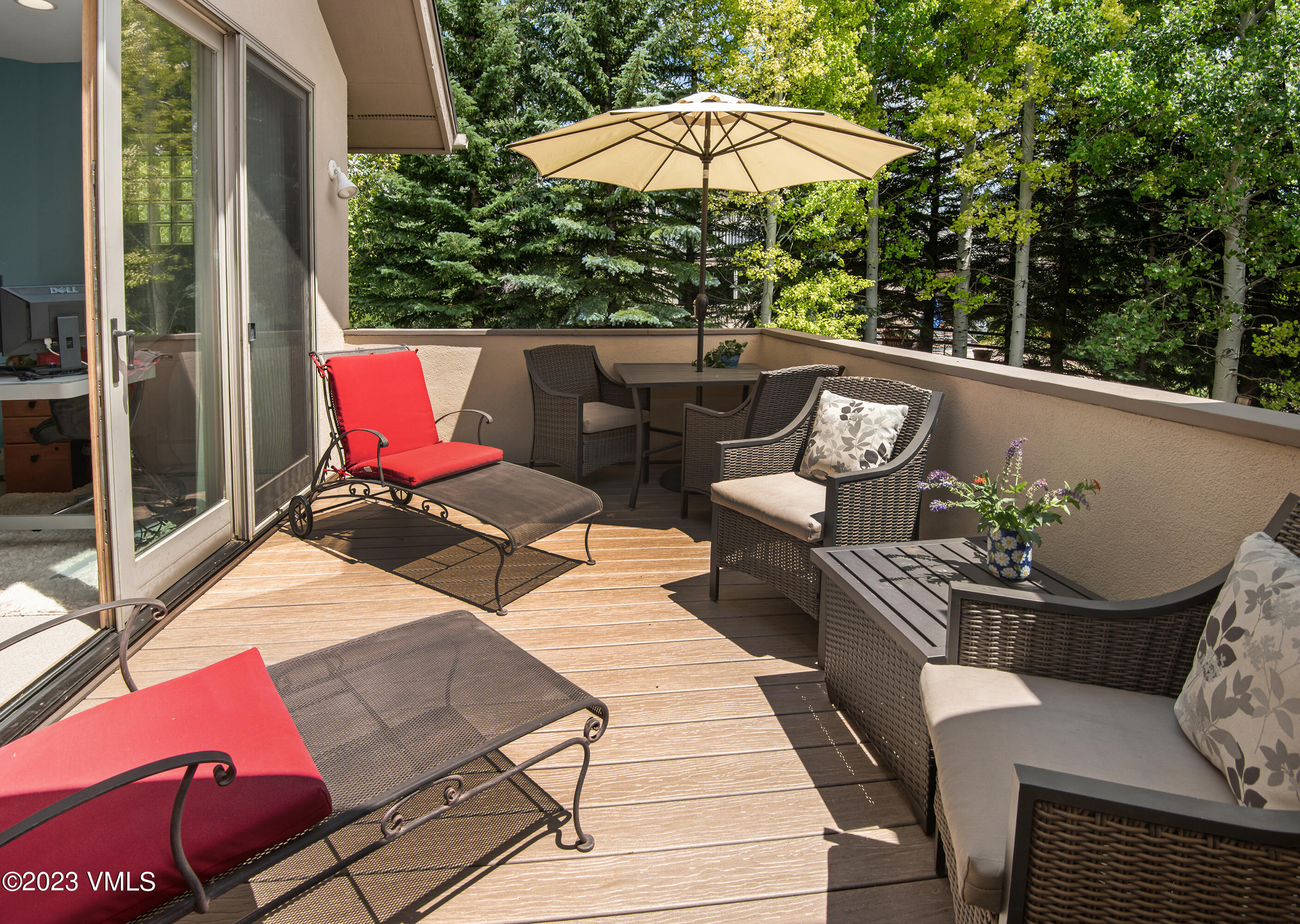 1471 Singletree Road Edwards, CO 81632 - Photo 28 of 47 a view of balcony with wooden floor and outdoor seating