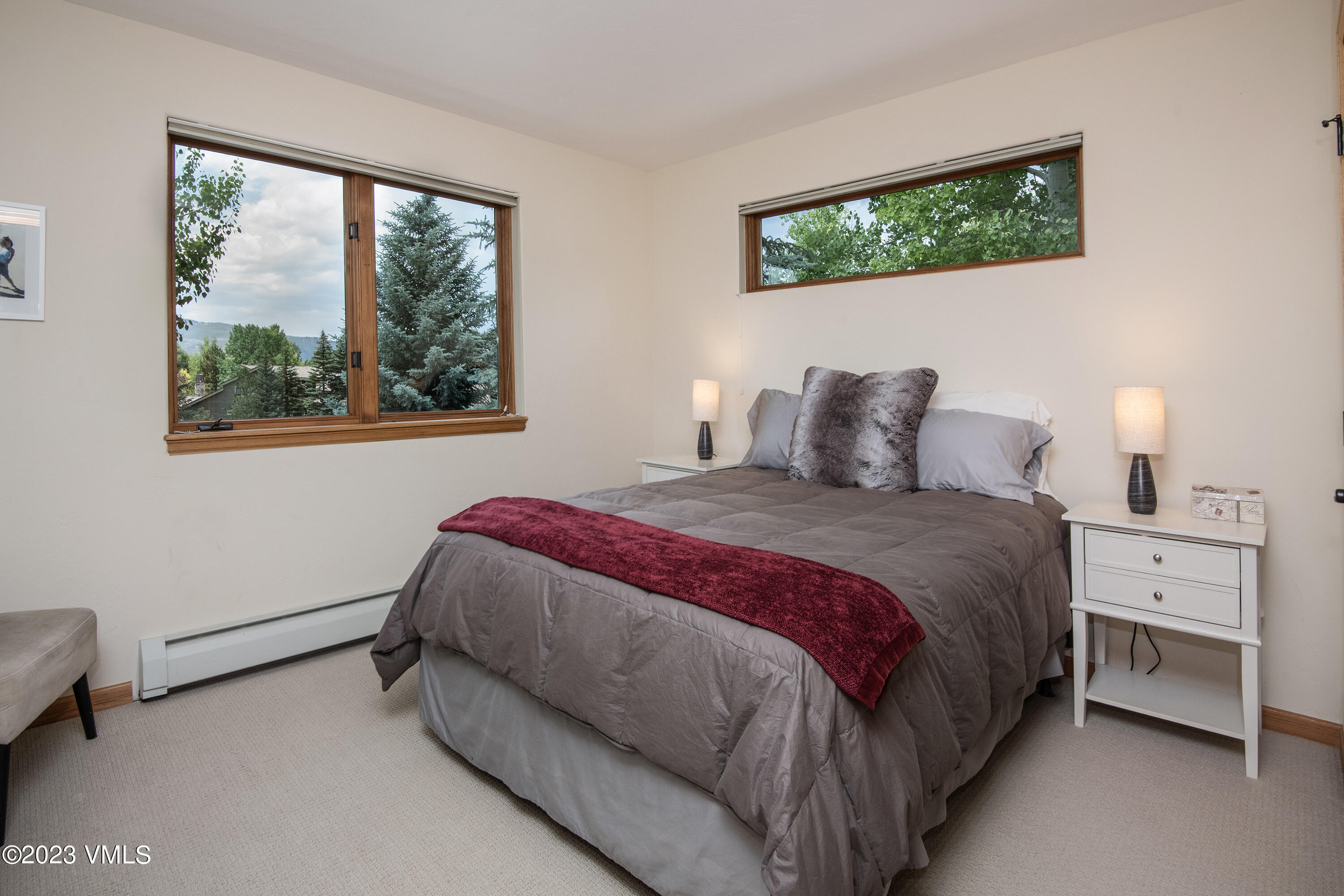 1471 Singletree Road Edwards, CO 81632 - Photo 34 of 47 a bedroom with a bed and a window