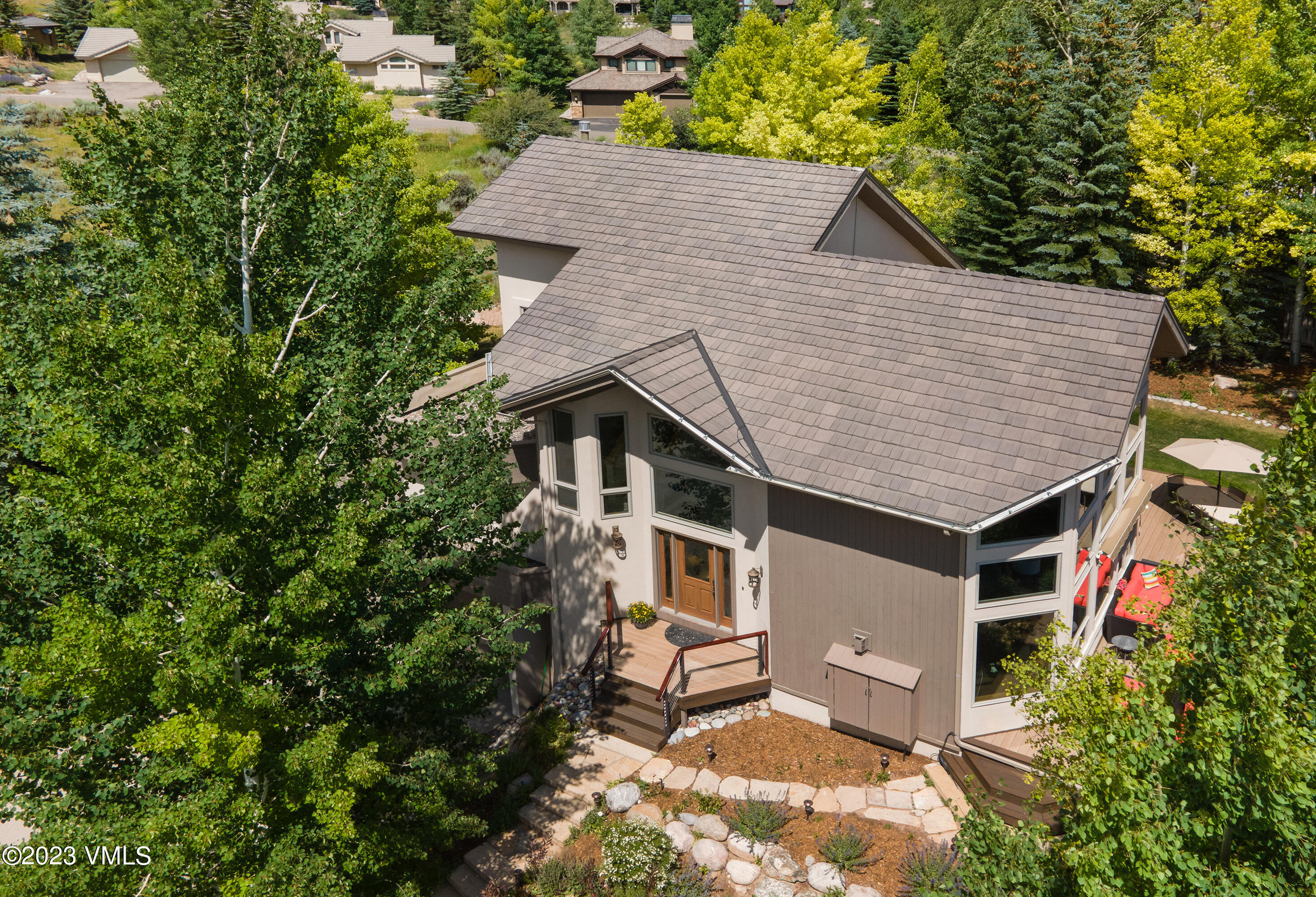 1471 Singletree Road Edwards, CO 81632 - Photo 42 of 47 a aerial view of a house with a yard and potted plants