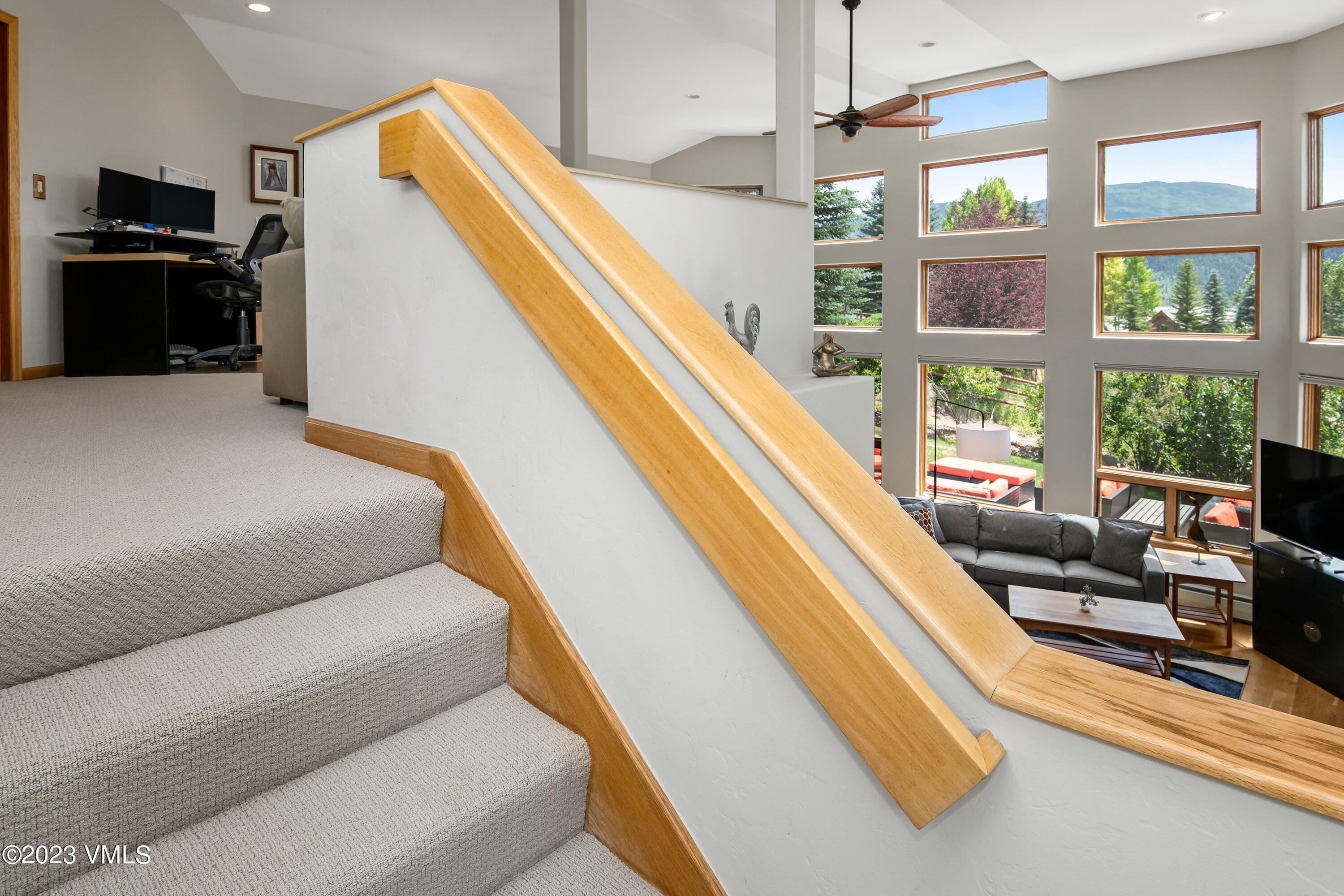 1471 Singletree Road Edwards, CO 81632 - Photo 46 of 47 a living room with furniture and a flat screen tv