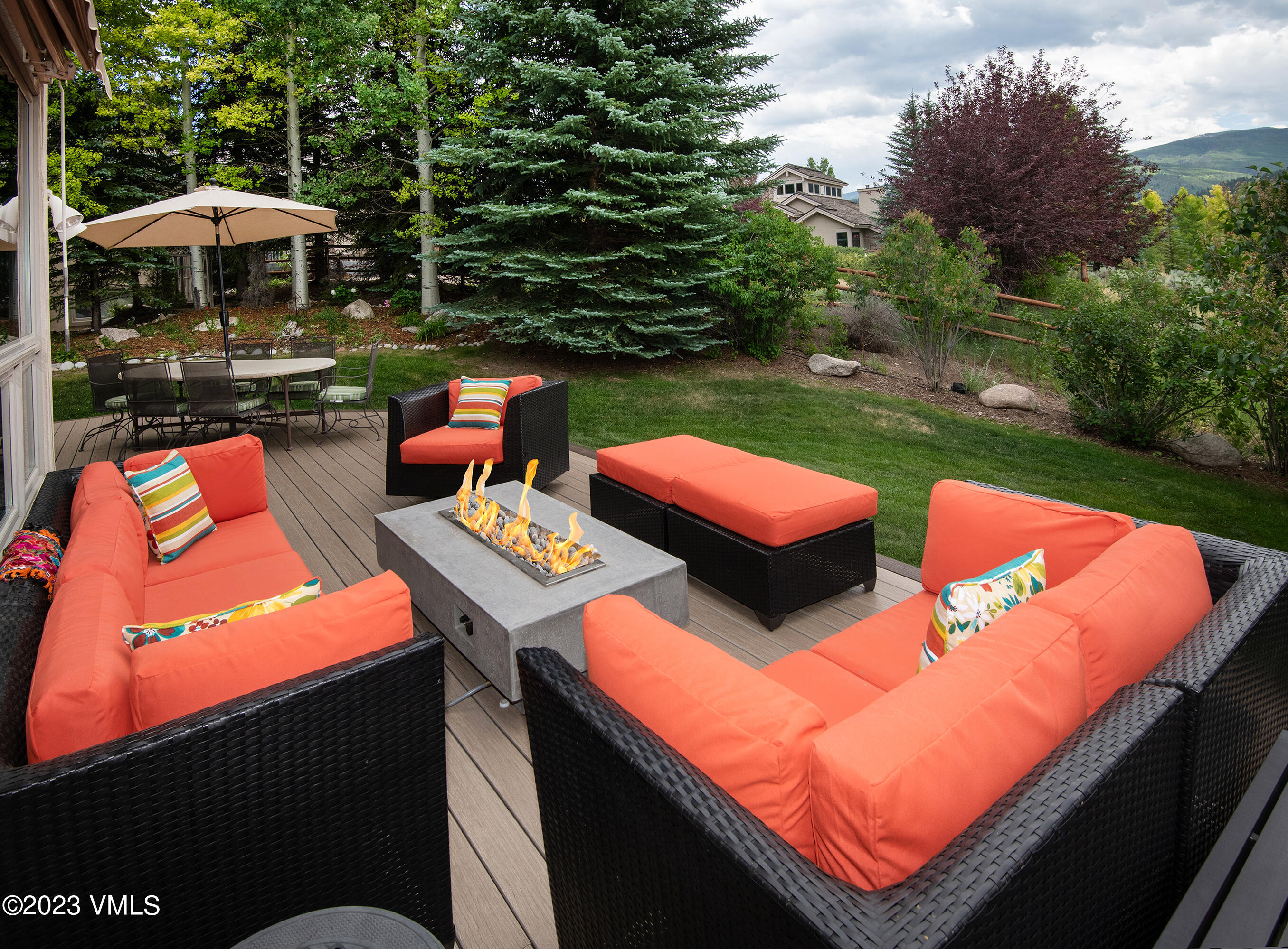 1471 Singletree Road Edwards, CO 81632 - Photo 5 of 47 an outdoor sitting area with chairs and table