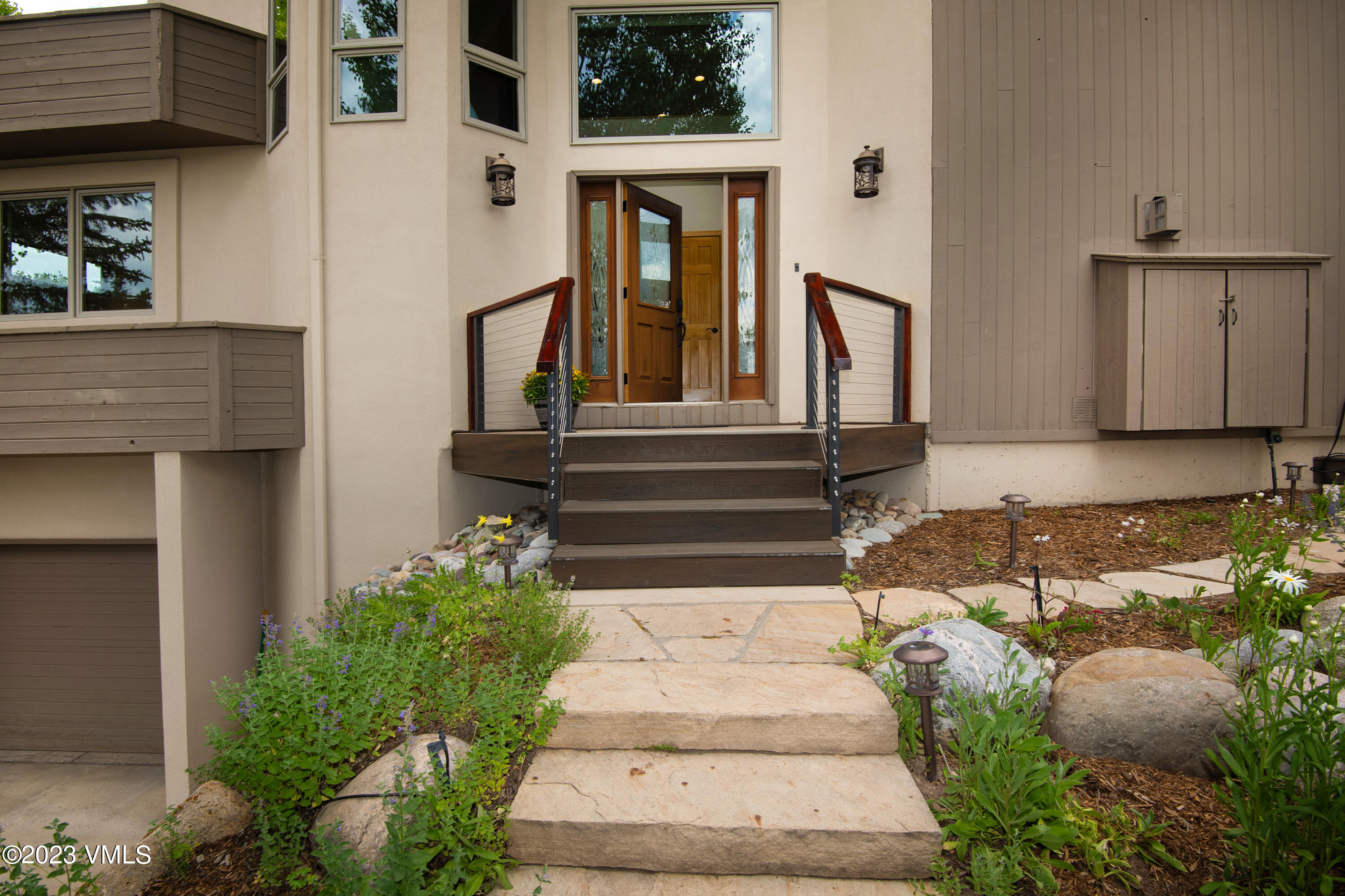 1471 Singletree Road Edwards, CO 81632 - Photo 8 of 47 a view of entrance gate of building and stairs
