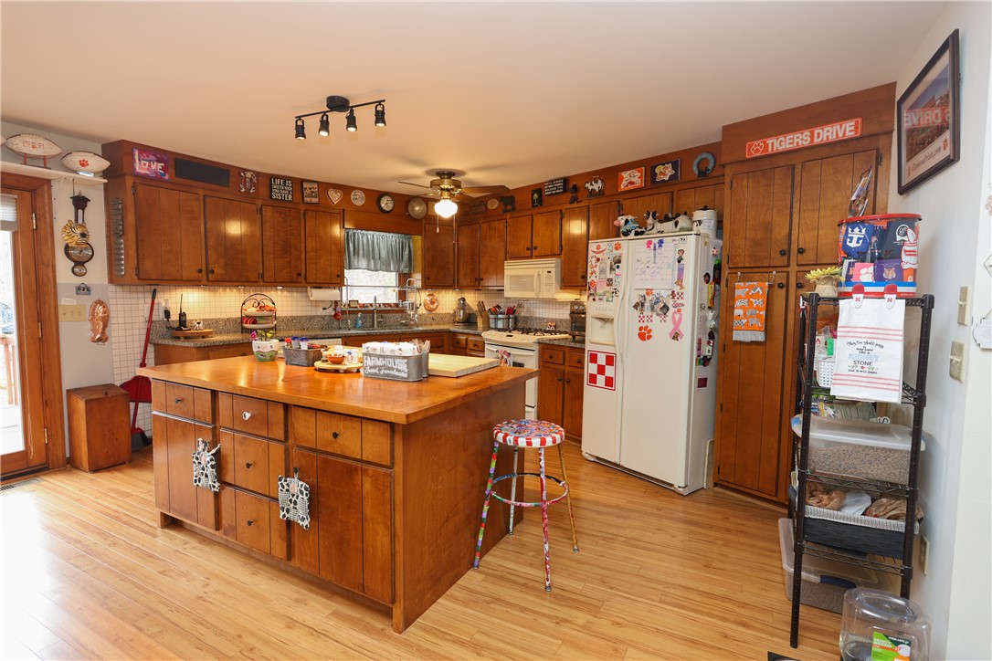518 Inlet Drive Seneca, SC 29672 - Photo 17 of 48 Kitchen island is not fixed -- added and simply sitting on floor if buyer desires to remove or rework it.