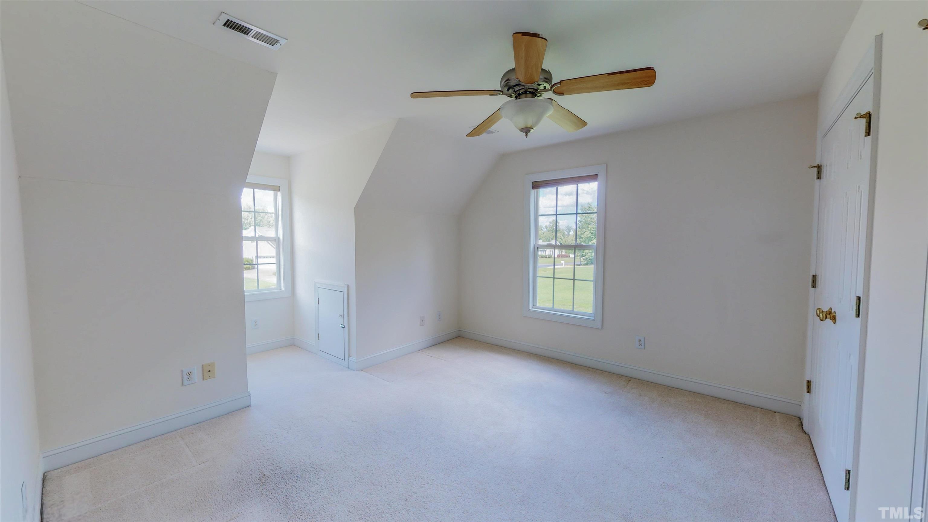 151 Fletcher Ridge Road Timberlake, NC 27583 - Photo 34 of 49 a view of empty room with ceiling fan