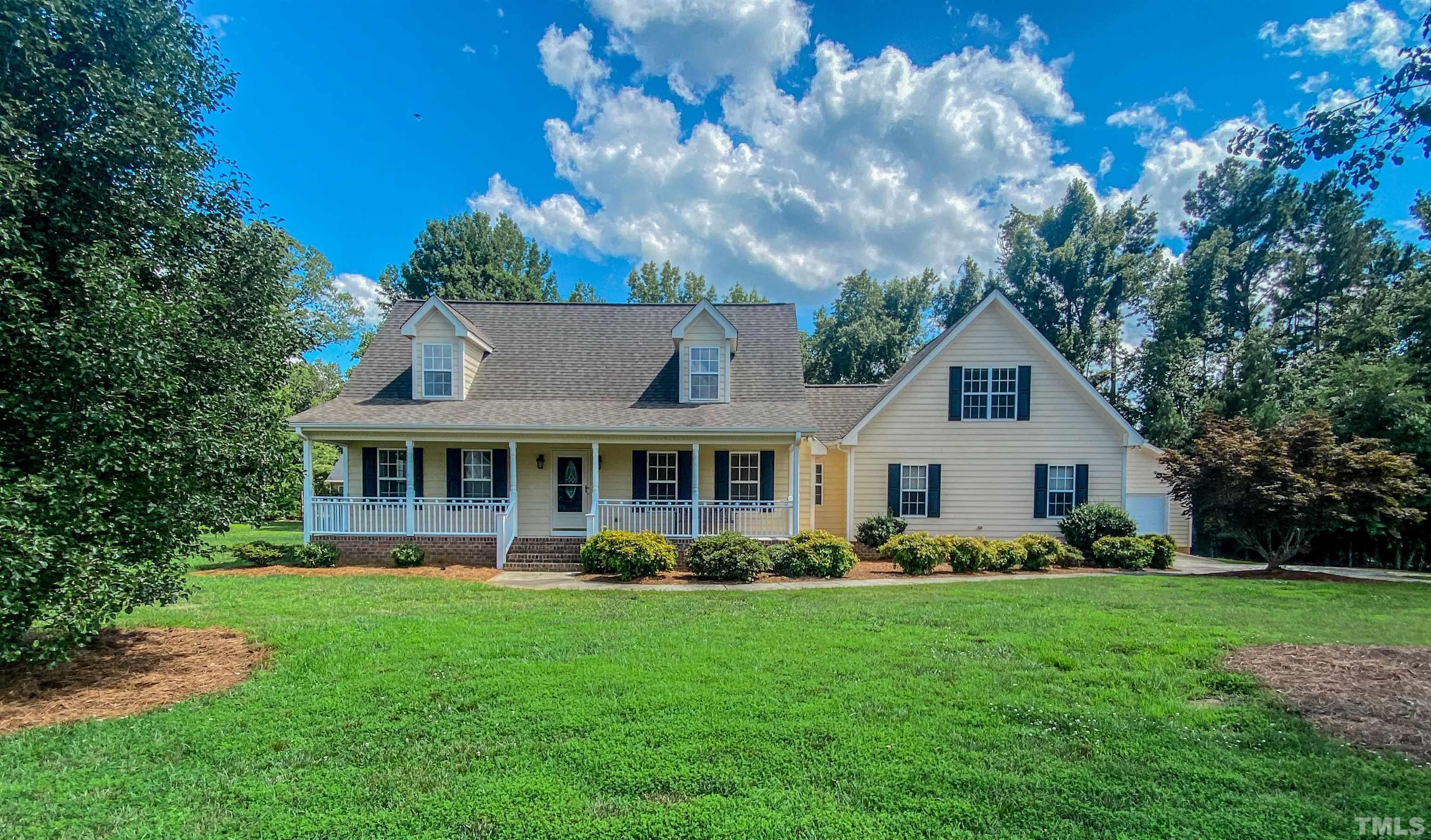 151 Fletcher Ridge Road Timberlake, NC 27583 - Photo 48 of 49 a front view of house with yard and green space