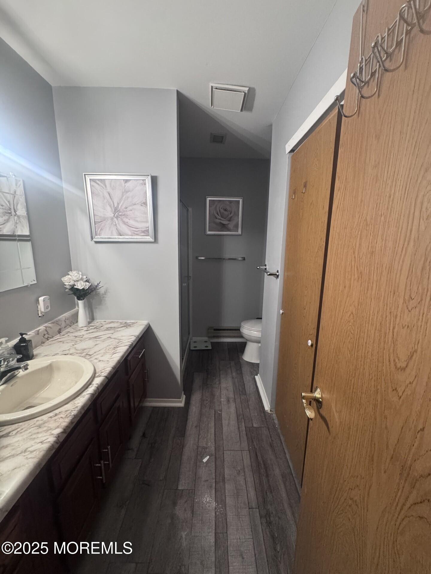 6 A Winthrop Place Whiting, NJ 08759 - Photo 18 of 18 a bathroom with a granite countertop sink toilet and shower