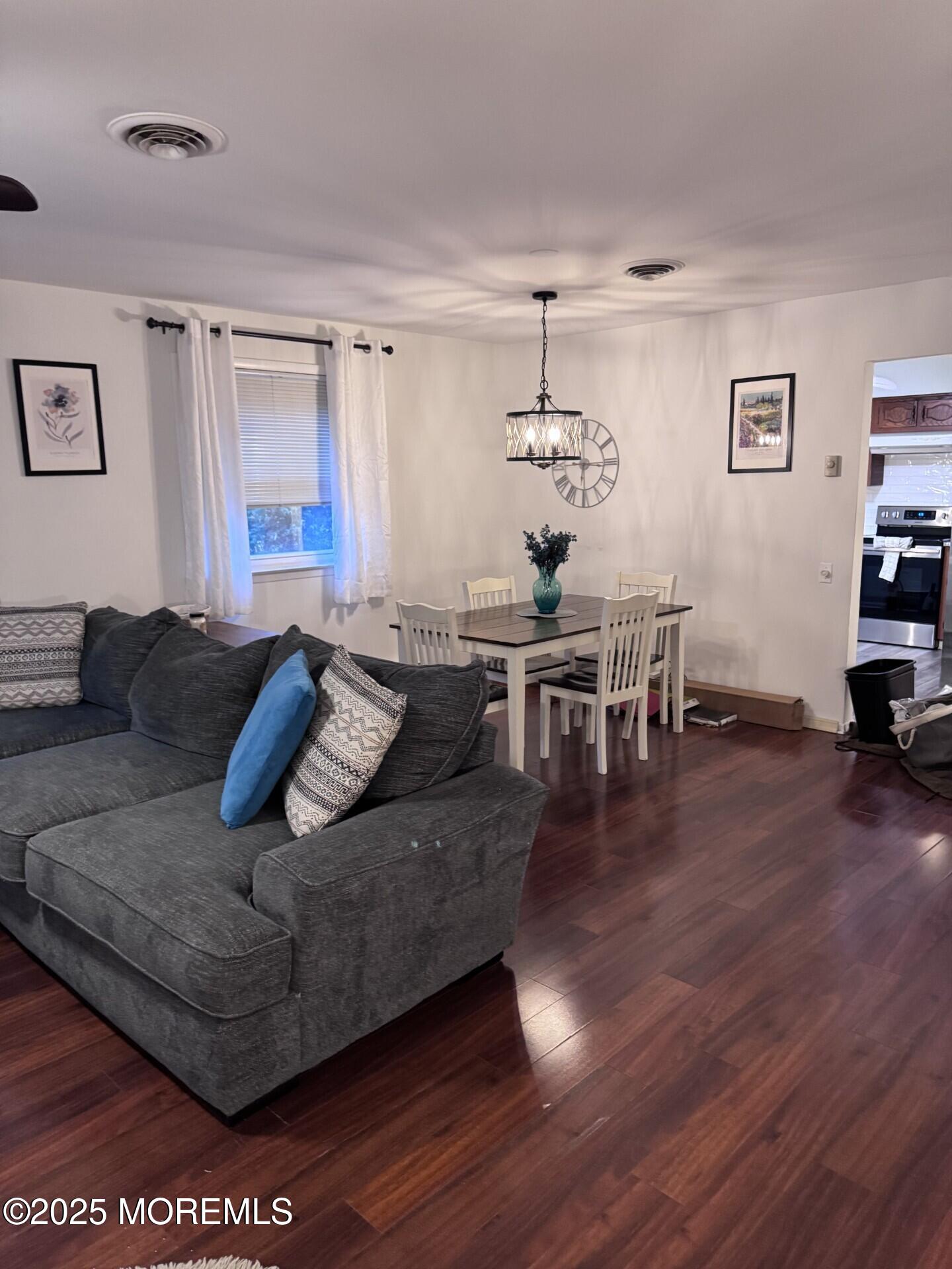 6 A Winthrop Place Whiting, NJ 08759 - Photo 3 of 18 a living room with furniture and wooden floor
