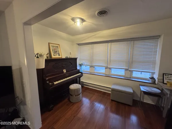 a bathroom with a bathtub and a sink