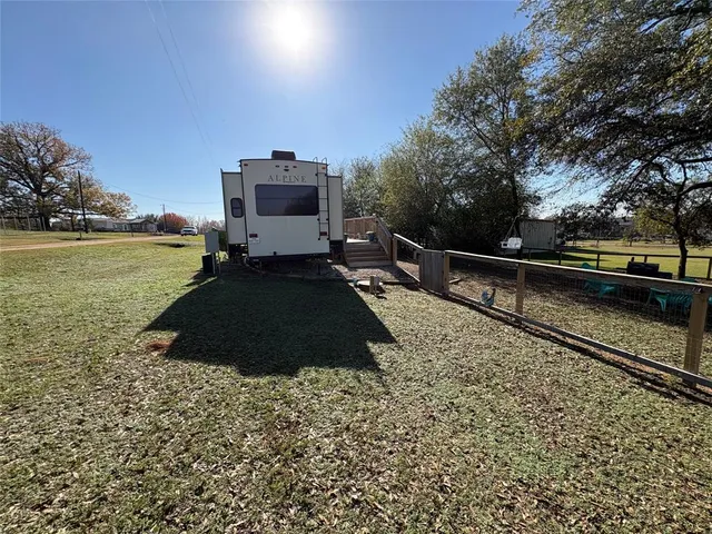 a vase of flowers sitting on a table