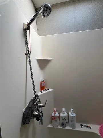 a bathroom with a sink vanity and mirror