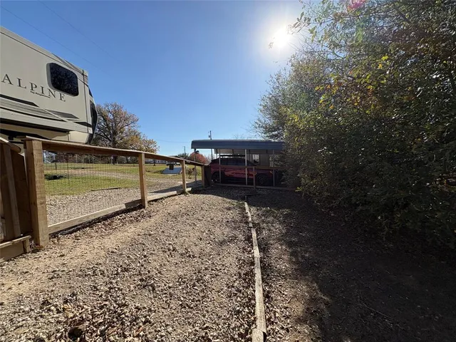 a view of a balcony with chairs