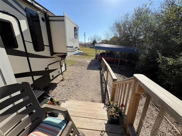 a view of buildings and small yard