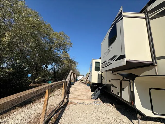 a view of a street with sitting area