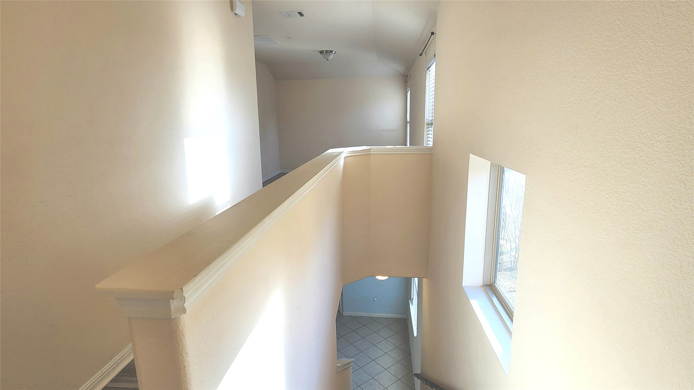 5432 Juniper Jct Lane Austin, TX 78744 - Photo 13 of 26 a view of a hallway with windows