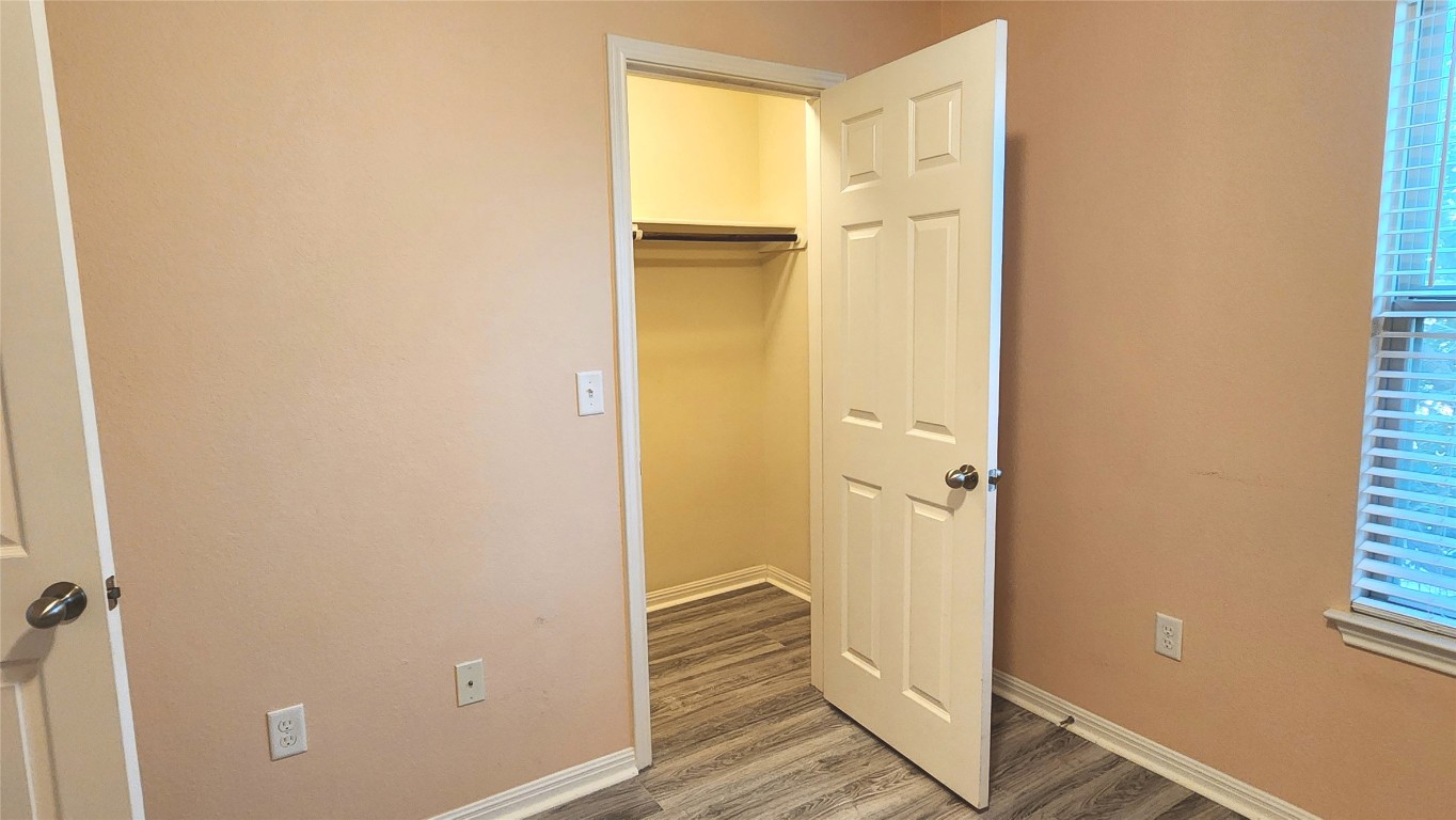 5432 Juniper Jct Lane Austin, TX 78744 - Photo 22 of 26 a view of front door with wooden floor