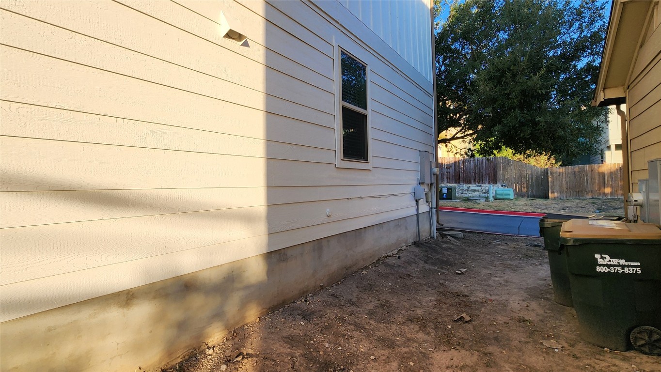 5432 Juniper Jct Lane Austin, TX 78744 - Photo 26 of 26 a house view with a bench