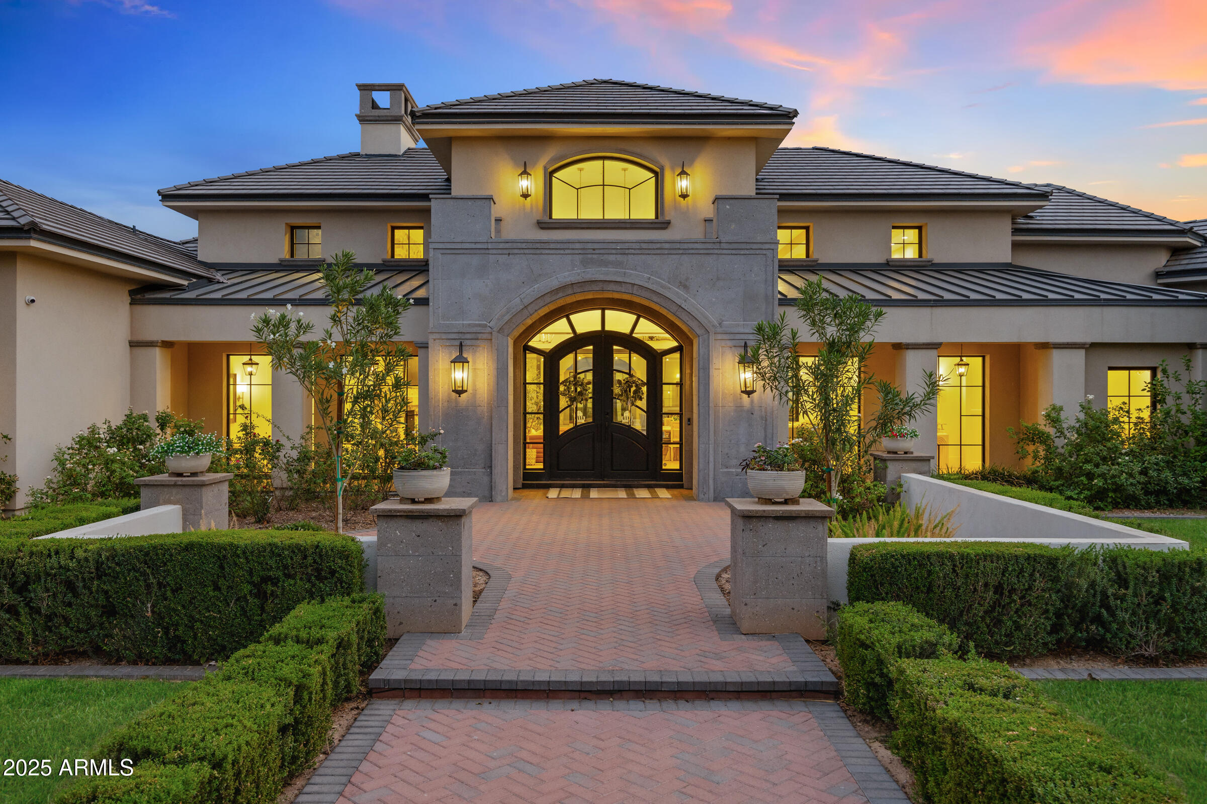 20623 East Cloud Road Queen Creek, AZ 85142 - Photo 105 of 115 a view of a house with large windows and a yard in front of it