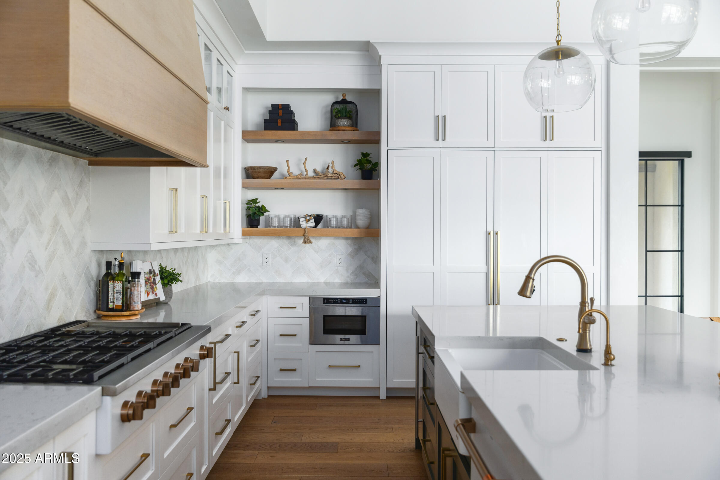 20623 East Cloud Road Queen Creek, AZ 85142 - Photo 20 of 115 a kitchen with stainless steel appliances granite countertop a sink stove and refrigerator