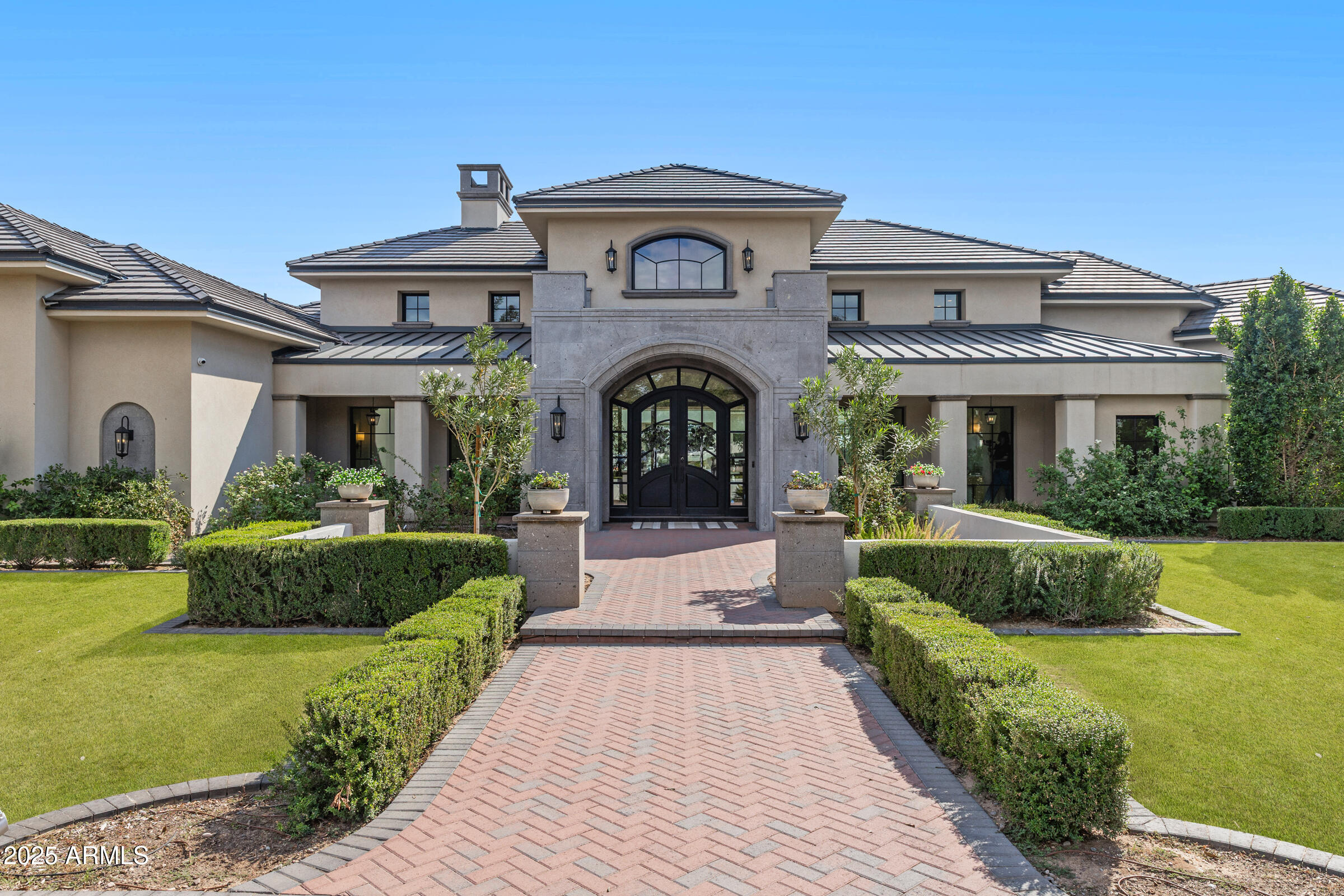 20623 East Cloud Road Queen Creek, AZ 85142 - Photo 3 of 115 a front view of a house with a yard