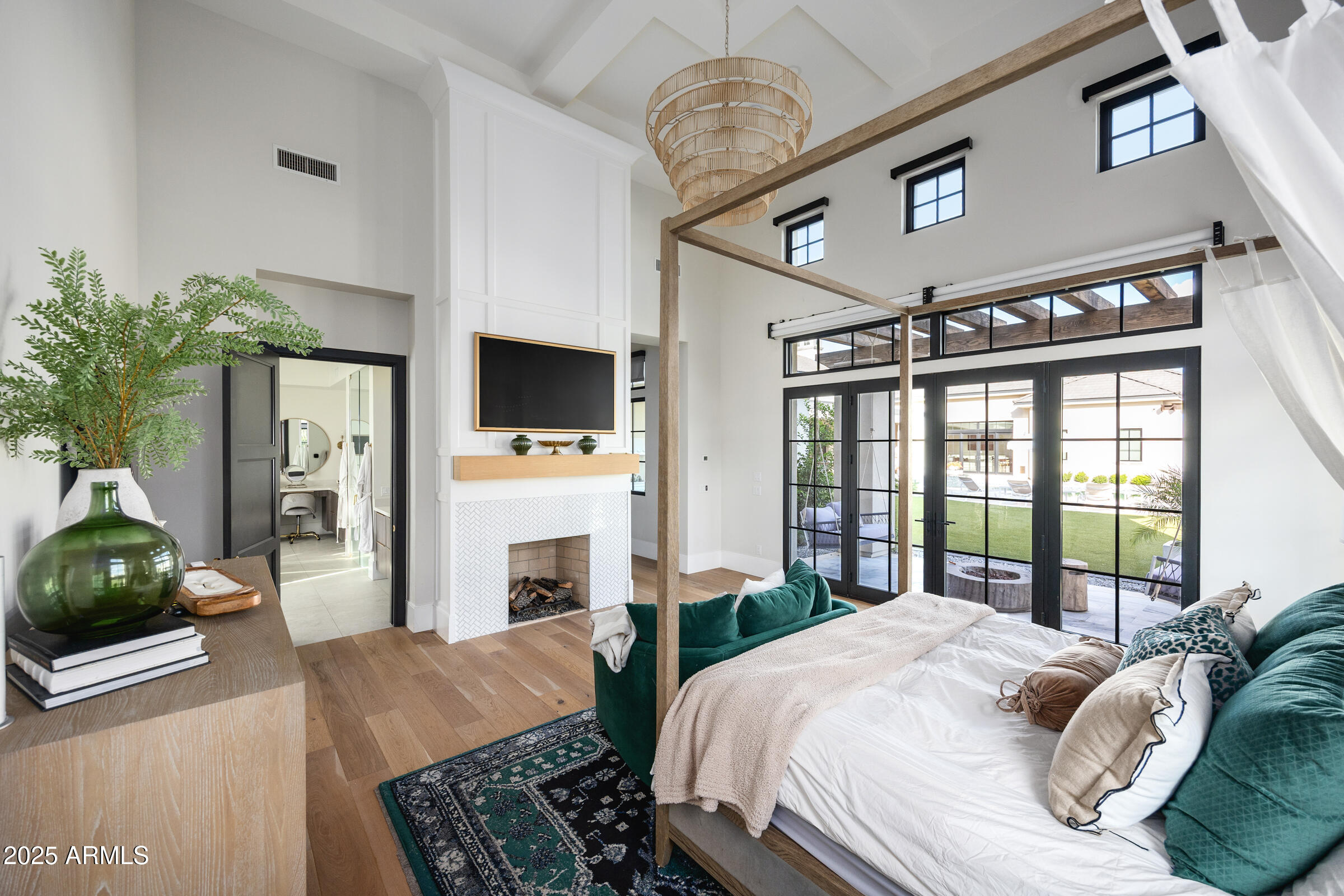 20623 East Cloud Road Queen Creek, AZ 85142 - Photo 32 of 115 a bedroom with a bed window and a flat screen tv