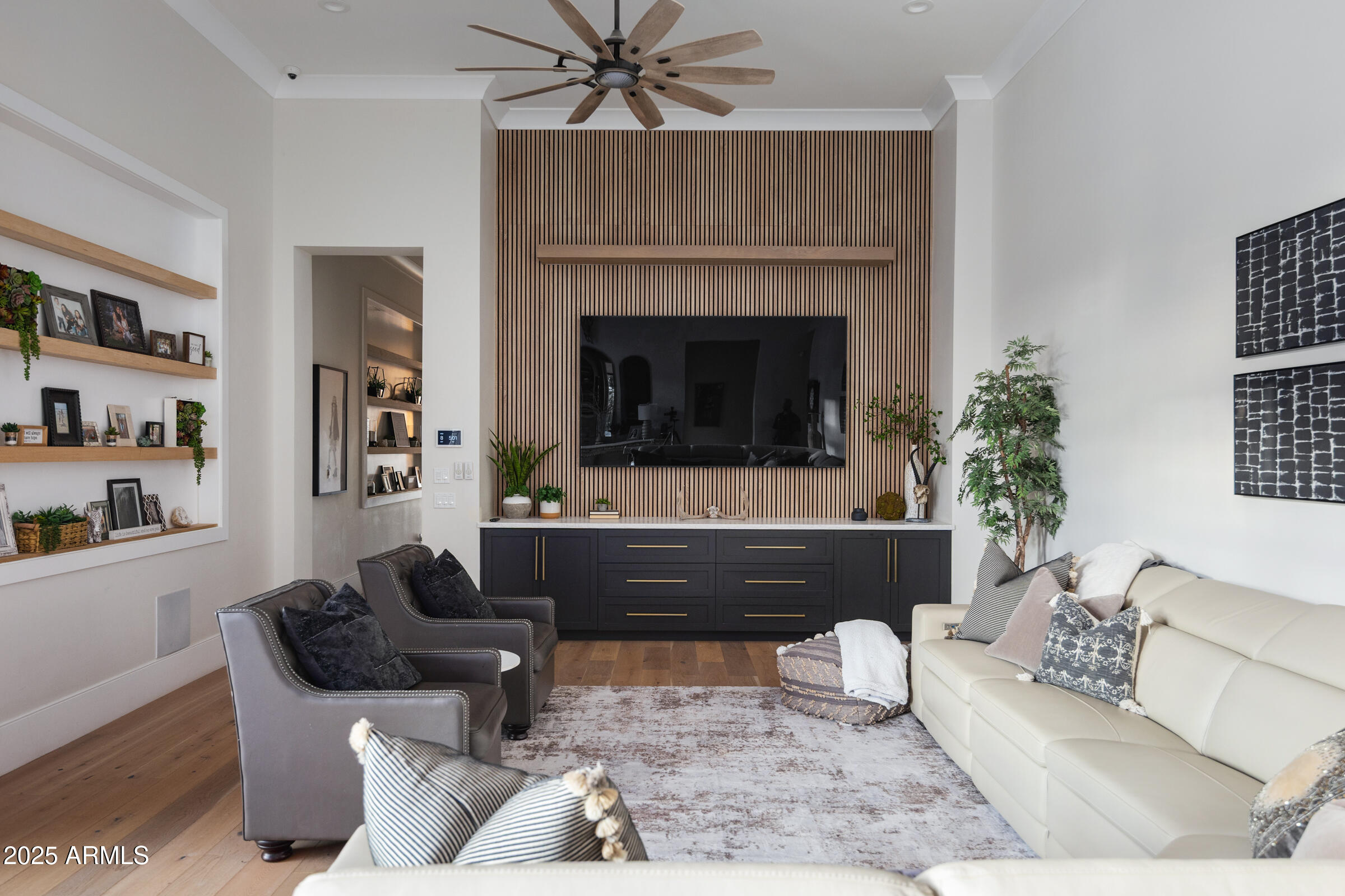 20623 East Cloud Road Queen Creek, AZ 85142 - Photo 45 of 115 a living room with furniture and a fireplace