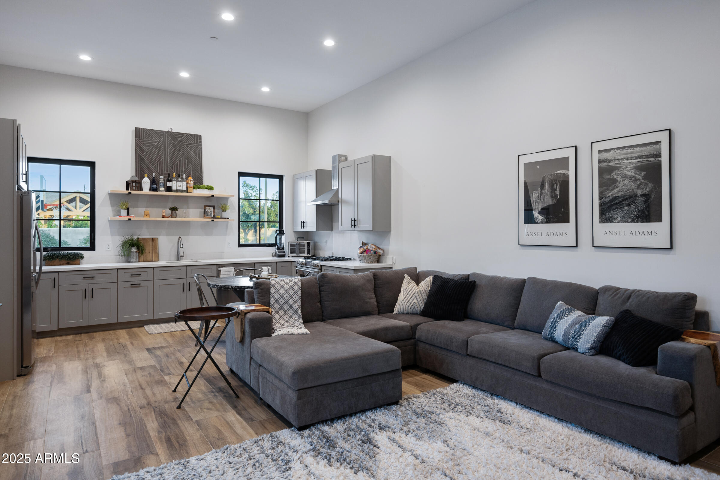 20623 East Cloud Road Queen Creek, AZ 85142 - Photo 74 of 115 a living room with furniture and a wooden floor