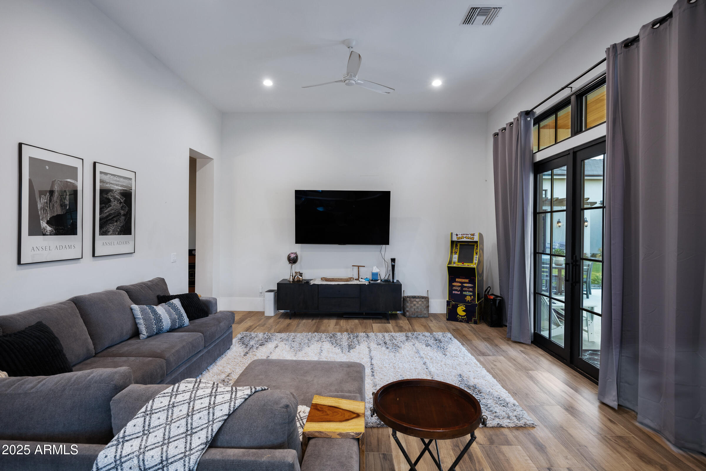 20623 East Cloud Road Queen Creek, AZ 85142 - Photo 76 of 115 a living room with furniture and a flat screen tv