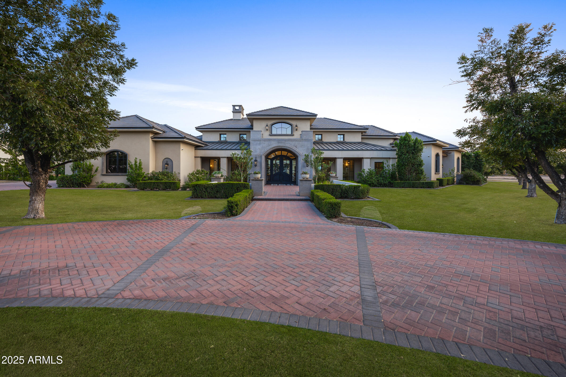 20623 East Cloud Road Queen Creek, AZ 85142 - Photo 82 of 115 a front view of a house with a yard and garage