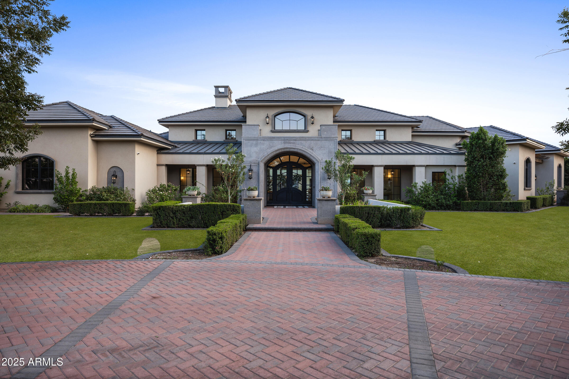 20623 East Cloud Road Queen Creek, AZ 85142 - Photo 83 of 115 a front view of a house with a garden and yard